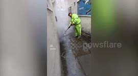 Window cleaner becomes online sensation after pressure washing his hometown's filthy pavements in his spare time