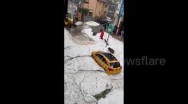 Roads in Catalonia resemble arctic wasteland as heavy rain and hail sweeps across area