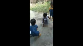 Startling act of sibling play: twin boys' mischievous toy hit leaves girl in tears