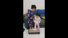 Kids enjoy workout with vertical vibration machine
