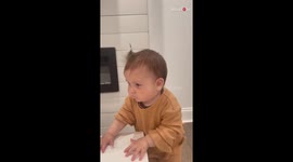 Silly toddler is stuck wondering where her lollipop went