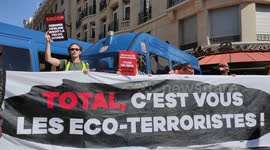 Climate activists protest in Paris on day of TotalEnergies' general meeting