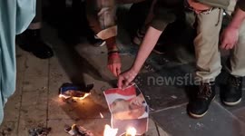 Protesters burn photos of Putin and Lavrov in Tbilisi, Georgia