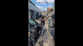 Baseball bat breaks while attempting to break car window in music video fail