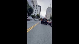 Crowd queuing for Zhu concert goes wild for guy racing down San Fransisco street on a BIN