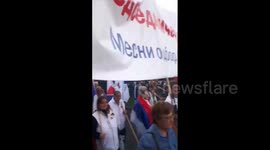Serbia: Protesters Brave Rain In Belgrade To Rally In Support Of President Vucic After Mass Shootings