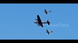 Lancaster bomber and Spitfires fly over Liverpool to mark Battle of the Atlantic anniversary