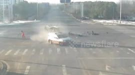 Electro-tricycle has nasty crash with SUV at crossroads
