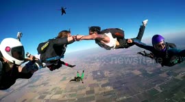 Two people get married during a skydive
