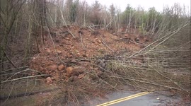 U.S. road closed from landslide. Heavy rain causes several landslides in U.S.