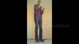 Musician beat boxes with recorder while tap dancing at the same time