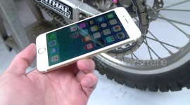 What happens if you jam an iPhone 6s in a dirt bike?