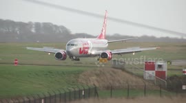 Storm Henry - plane battling with winds at Leeds Bradford Airport