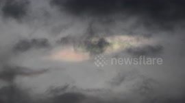 Rare colourful nacreous clouds filmed through 400mm lens