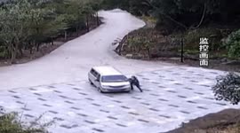 Driver crushed by car after forgetting to put handbrake on