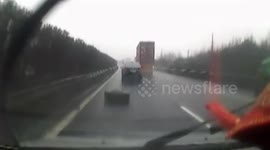 Tyre falls from lorry and hits car behind