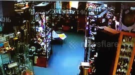 picture falling from another angle in haunted antiques centre