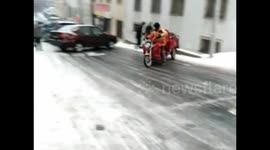Motortricycle loses control on icy road