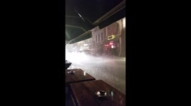 Sheltering as torrential rain hits London