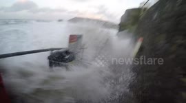 Hilarious video! Storm Imogen waves nearly sweep man away in Portreath Cornwall!!