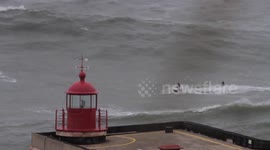 Australian surfer Mick Corbertt rides huge storm waves in Nazare, Portugal