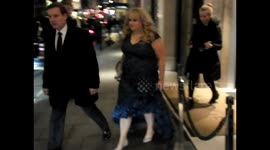 Rebel Wilson leaves to attend How to be Single premiere