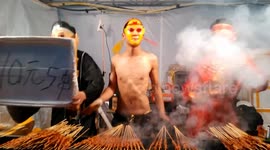 Energetic food stall staff dress up as Chinese novel characters and dance wildly