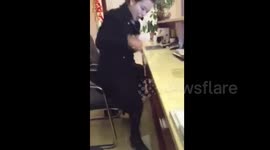 Woman hits phone on table after failing to get big red packet
