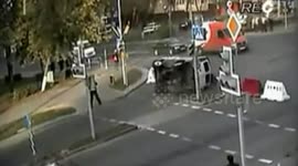 Driver jumps out of coach when it collides with a car