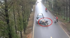 Helmet saves motorcyclist's life in nasty crash with 4x4