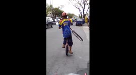 Philippines man rides a bike - in two different parts