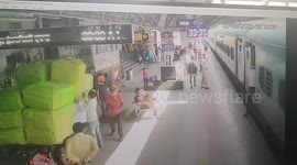 Elderly passenger slips while boarding moving train in eastern India, saved