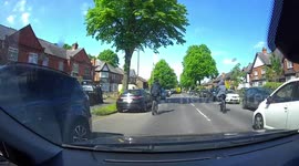 Impatient driver nearly hits 2 schoolboy cyclists as they ride home in Birmingham, UK