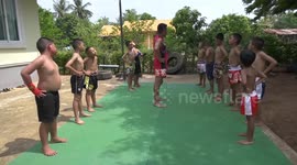 Retired boxer teaches kids Muay Thai for free in Thailand