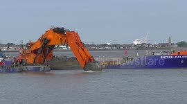 Monster backhoe dredger Goliath digging spoil from the seabed at Harwich Harbour, deepening the main navigation channel for extremely large container ships calling at the Port  of Felixstowe, 21 May 2023