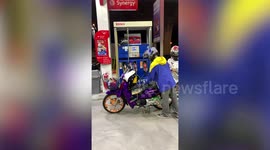 Rider modifies motorcycle with three wheels so he can ride with his pet