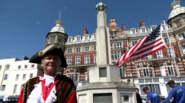 British town marks Memorial Day with tributes to US soldiers who departed from port