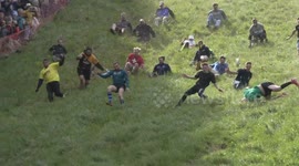 Several injured as daredevil from Manchester wins Cheese Rolling 2023
