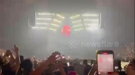 Footage shows rapper Anuel AA accidentally launching a motorbike off stage after bringing it on during a concert