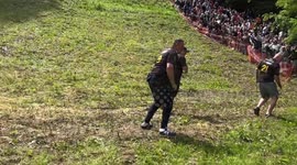 Event staff rush to injured contestants' aid as Cheese Rolling 2023 kicks off