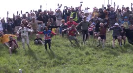Thrills and spills as Cheese Rolling event 2023 leads to multiple injuries in Gloucestershire, UK