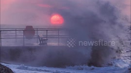 Strong winds and waves batter Kent, UK coast at sunset