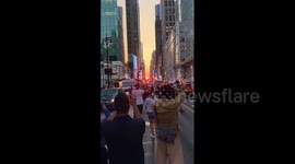 US: Manhattanhenge Lights Up New York City On Memorial Day 3