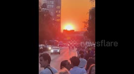Manhattanhenge lights up New York City on Memorial Day