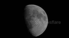 International Space Station ISS lunar transit, flying in front of Moon as seen from Chamonix France