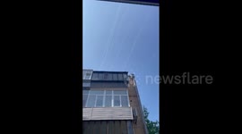 Russian missiles streak across sky in Kyiv, Ukraine