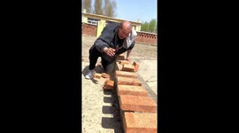Rural Kung Fu master shatters bricks with bare hands: a display of Chinese martial arts prowess