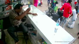 Man promptly leaves mobile shop as he spots huge snake crawling on his desk