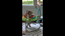 Baby boy can't stop laughing while watching fierce lions hunting prey