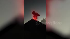 Fuego volcano sends hot rocks into air in big eruption while tourists enjoy natural display in Guatemala